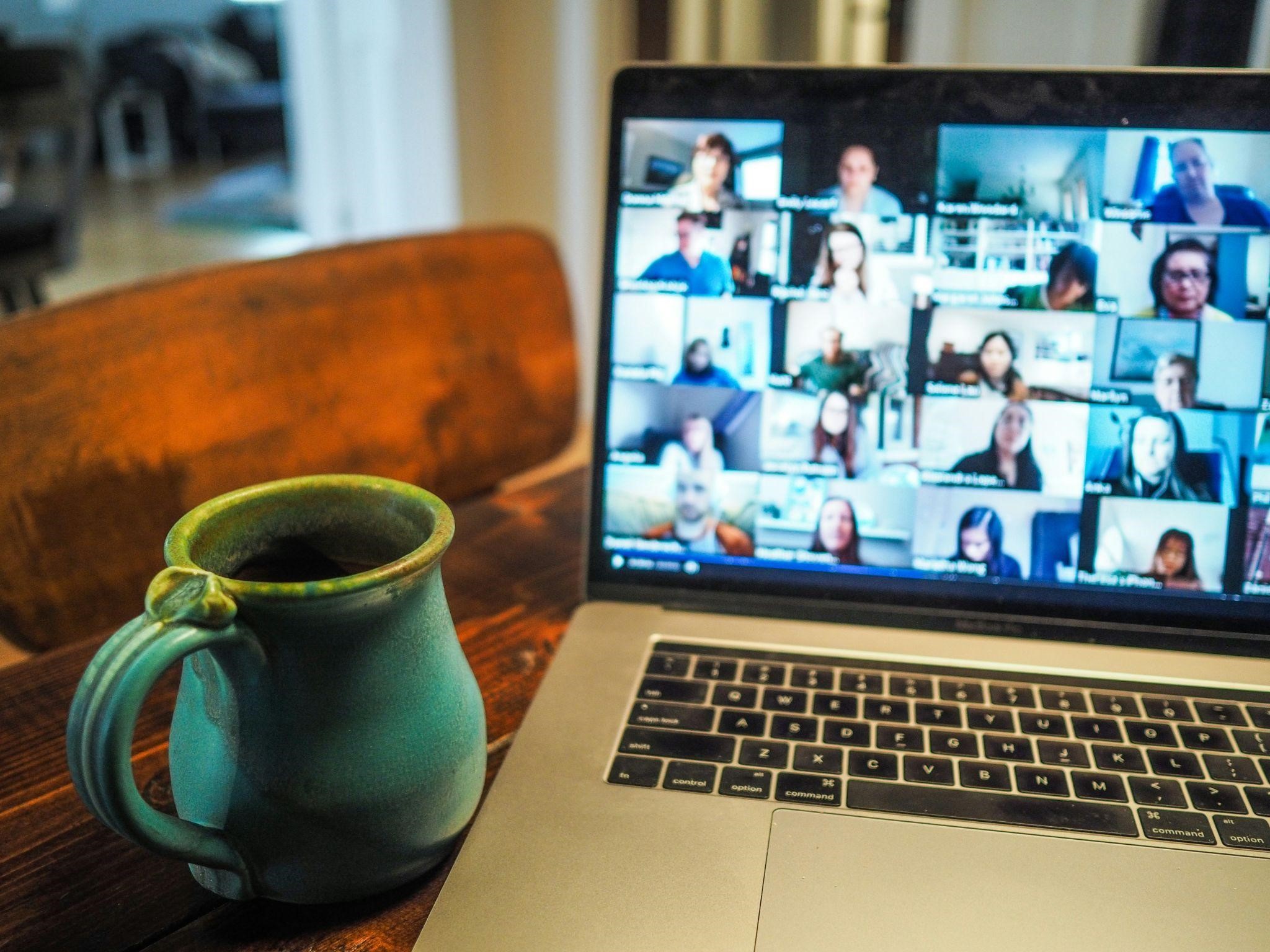 Macbook Pro displaying a group of people